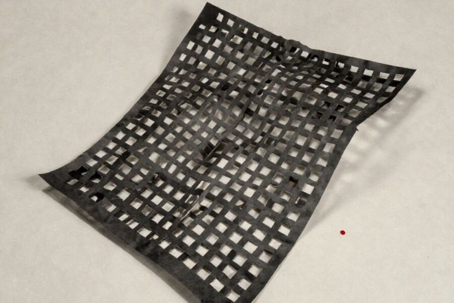Two paper lattices laid over one another at a slight angle